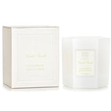 Hexagonal Antica Farmacista candle in soft white glass, infused with cucumber and lotus flower for 60 hours of serene fragrance.