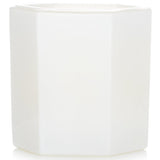 Luxurious Antica Farmacista Candle in a soft white container, featuring a refreshing cucumber and lotus flower scent for 60 hours.