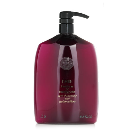 Luxurious 1000ml conditioner that enhances color-treated hair with moisture, protection, and vibrant, long-lasting shine.