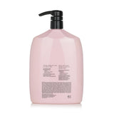 Luxurious Oribe Serene Scalp Balancing Conditioner, 1000ml, soothes scalp, hydrates hair, removes dandruff, and adds shine.