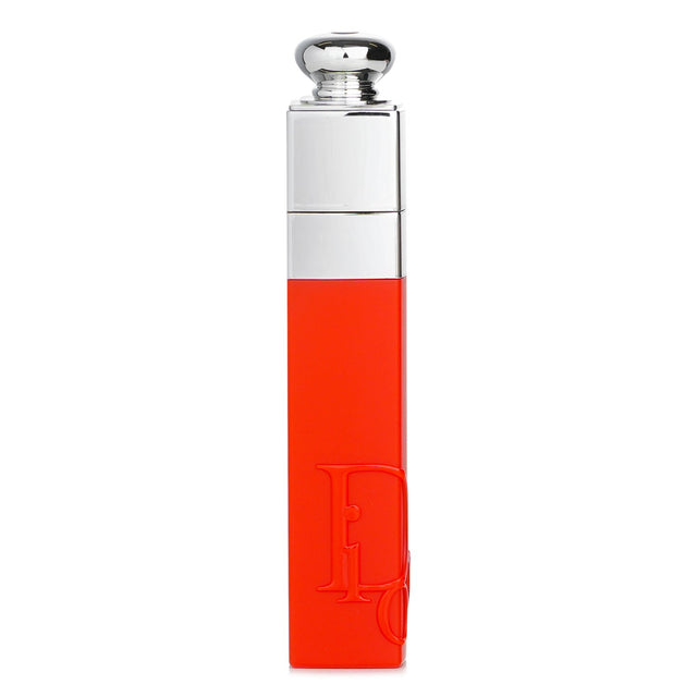 Dior Addict Lip Tint in Natural Red Tangerine, a hydrating, no-transfer tint with a semi-matte finish and 95% natural ingredients.