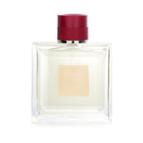 Guerlain Habit Rouge Eau De Toilette Spray in a refined square bottle, featuring a citrus amber scent for the sophisticated man.