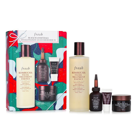 Four-piece Black Tea Essentials Set, featuring essence, serum, eye concentrate, and cream for rejuvenated, firm skin.