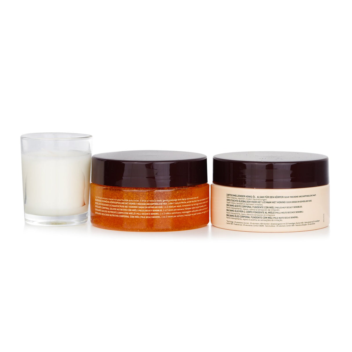 Nuxe Honey Lover Set: 3-piece skincare set featuring body scrub, oil balm, and candle for silky, nourished skin.