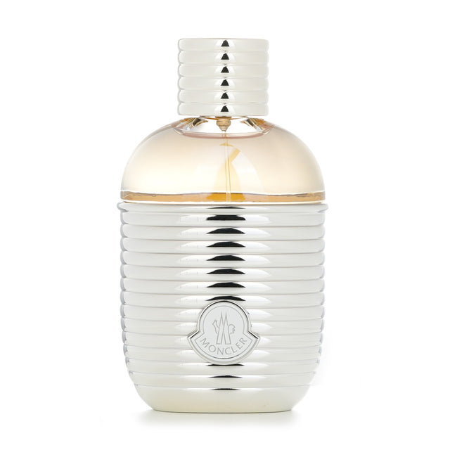 Flask-shaped bottle of Moncler Pour Femme 100ml Eau De Parfum embodies alpine elegance with floral and woody notes.