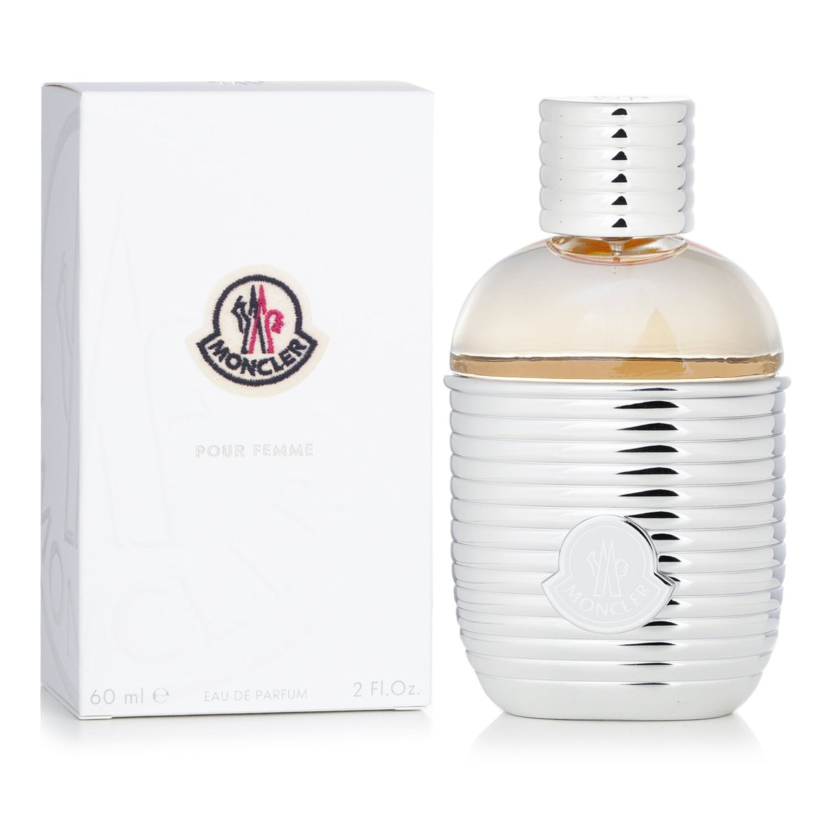 Bottle of Moncler Pour Femme Eau De Parfum, floral and woody scent inspired by alpine forests, in a ribbed silver flask.