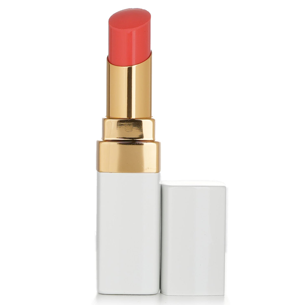 Chanel Rouge Coco Baume #916 in Flirty Coral offers hydrating, buildable color for beautifully nourished lips.