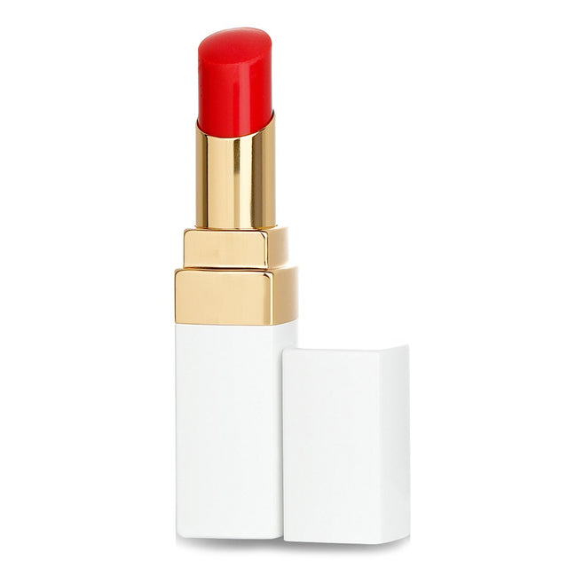 Chanel Rouge Coco Baume #920 In Love, a hydrating tinted lip balm offering buildable color and 12-hour comfort in chic packaging.