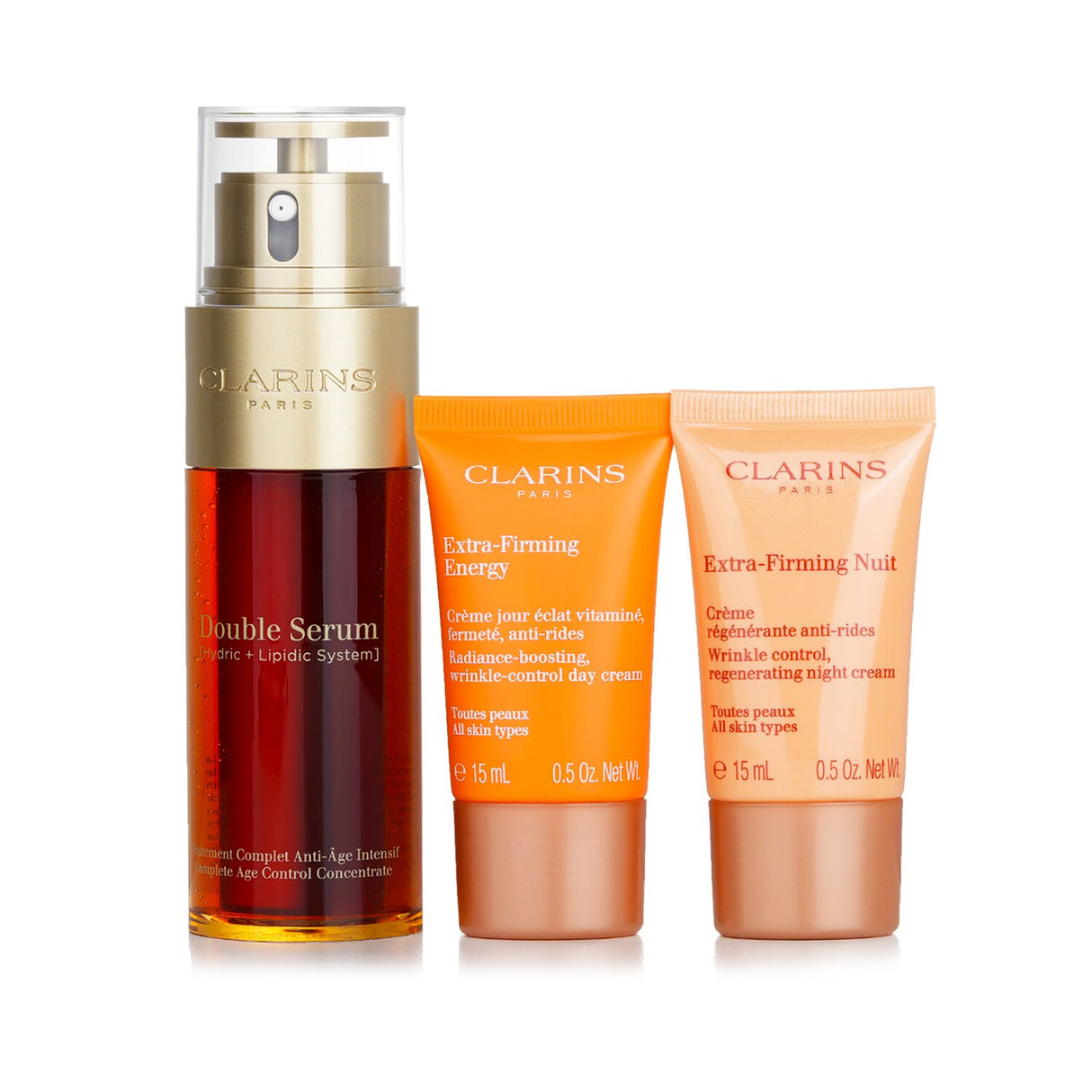 Clarins Double Serum & Extra-Firming Collection set with serum, day cream, night cream, and stylish bag for youthful skin.