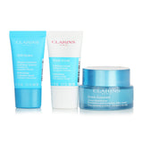 Hydration skincare set with Hydra-Essentiel Cream, Fresh Scrub, SOS Mask, and stylish travel bag for all skin types.