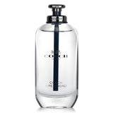 Coach Open Road Eau De Toilette in a sleek bottle, exuding a fresh, woody aroma perfect for adventurous men.