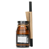 Reed diffuser in elegant packaging, featuring refreshing apple and pear scent for a cozy home ambiance.