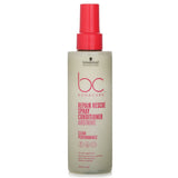 Lightweight spray conditioner by Schwarzkopf, enriched with arginine for repairing and detangling damaged hair effectively.