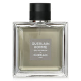 Guerlain - Homme Eau De Parfum Spray in 100ml, featuring mint, rhubarb, geranium, patchouli, and cedar notes for a modern scent.