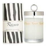 Rigaud Gardenia scented candle in a transparent glass with bow tie, offering a fresh floral fragrance and 90 hours of burn time.