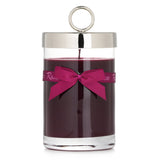 Rigaud Scented Candle in elegant glass, blends patchouli and teak for a luxurious woody aroma; burns for 90 hours.