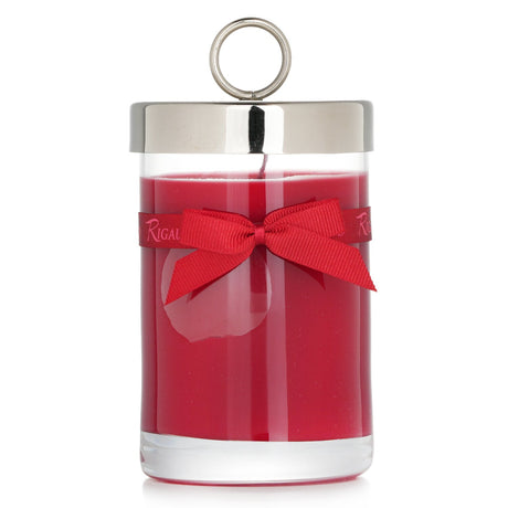 Rigaud La Vie En Rouge scented candle in a glass jar with bow, featuring red berry and geranium fragrance, 90-hour burn time.