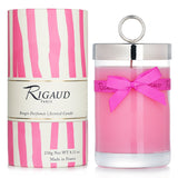 Luxury Rigaud scented candle in #Rose Couture, with rose, leather, and amber notes, in an elegant glass jar with a bow tie.