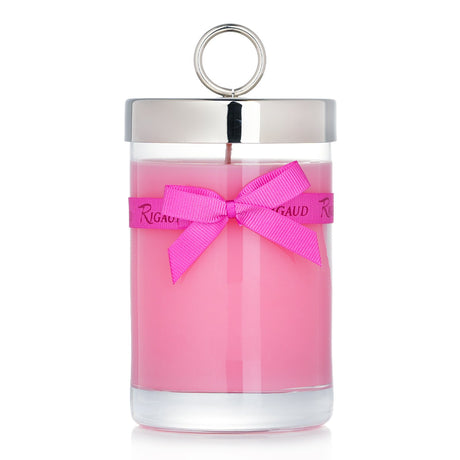 Luxurious Rigaud Rose Couture scented candle in a glass container, blending rose, leather, and amber for a chic ambiance.