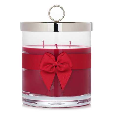 Rigaud La Vie En Rouge scented candle in a glass container, featuring red berry and geranium fragrance with 150-hour burn time.