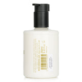 Luxurious Fireside Body Lotion with woody winter scents, light formula absorbs easily, cruelty-free and vegan.