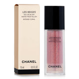 Water-fresh blush by Chanel in Intense Coral, ultra-lightweight, delivers a sheer, natural glow with lasting comfort.