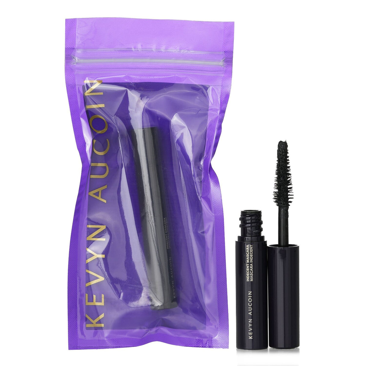 Travel-sized Kevyn Aucoin Indecent Mascara in #Black, offering voluminous, defined lashes with nourishing ingredients.