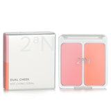 Dual blush duo in #4 Hot Living Coral featuring seamless creamy finish and smooth application for a radiant look.