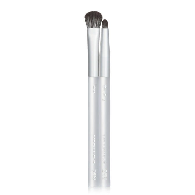 Set of 2 eyeshadow brushes: a Base Brush for vibrant color and a Blending Brush for seamless shade transitions.