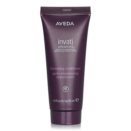 Travel-sized Aveda Invati Advanced Thickening Conditioner, infused with organic Amla and plant oils for fuller, healthier hair.