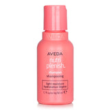 Travel size Aveda Nutriplenish Shampoo (50ml) for dry hair, infused with coconut oil and mango butter for deep hydration.