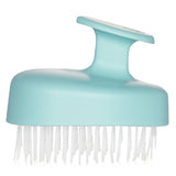 Aveda Scalp Solutions massager with flexible bristles for invigorating scalp massage and promoting healthy hair growth.