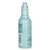 Aveda Scalp Solutions Protective Mist in a 100ml bottle, infused with adaptogenic botanicals for scalp rejuvenation.