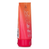 Schwarzkopf BC Bonacure Sun Protect 2 In 1 Treatment Coconut for sun-stressed hair, offering hydration, shine, and anti-frizz benefits.