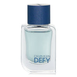 Calvin Klein Defy Eau De Toilette Spray mini, a 5ml citrus and woody fragrance for modern men, ideal for any occasion.