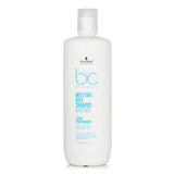 Schwarzkopf BC Moisture Kick Shampoo 1000ml, hydrating formula for normal to dry hair, enhances softness and shine.