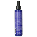 Matrix Total Results Brass Off Toning Spray in a 200ml bottle, ideal for neutralizing brassy tones in lightened hair.