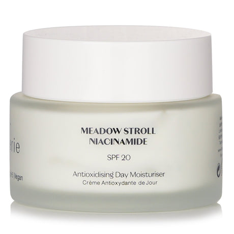 Vegan moisturizing cream with SPF 20, Avocado Oil, and Niacinamide for hydration, reduced pores, and youthful skin.
