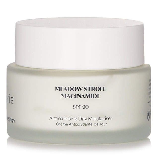 Vegan moisturizing cream with SPF 20, Avocado Oil, and Niacinamide for hydration, reduced pores, and youthful skin.