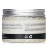 Cowshed Revive Foot Scrub in 150g jar, featuring avocado oil, aloe vera, and volcanic sand for soft, rejuvenated feet.
