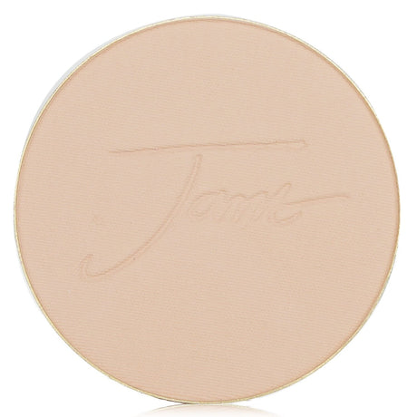 Compact foundation refill with SPF 20, offering sheer coverage, UV protection, and antioxidant benefits in Satin finish.