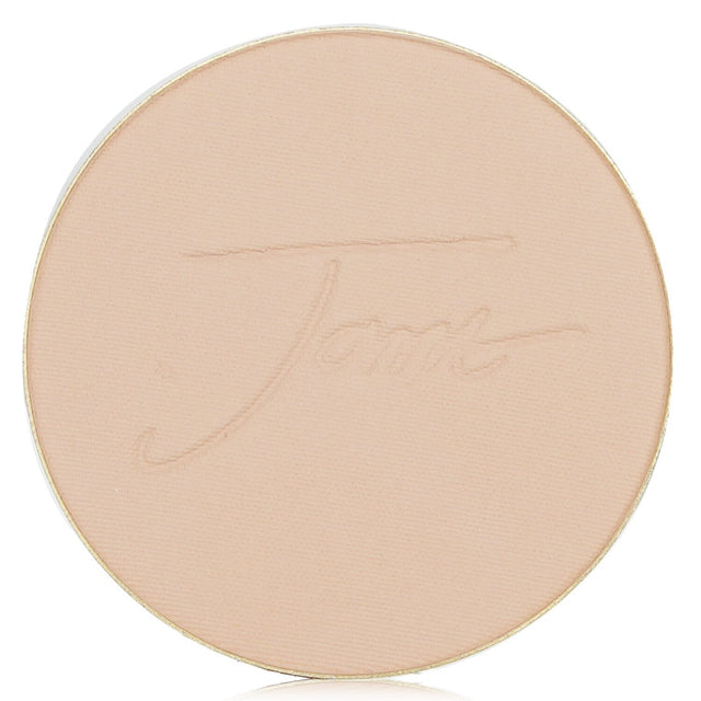 Compact foundation refill with SPF 20, offering sheer coverage, UV protection, and antioxidant benefits in Satin finish.