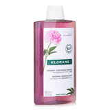 Klorane Shampoo with Peony Extract in a 400ml bottle for soothing irritated scalps, featuring 85% natural ingredients.