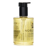 Noble Isle The Greenhouse Bath & Shower Gel in a 250ml bottle, featuring a botanical fragrance and nourishing formula for all skin types.