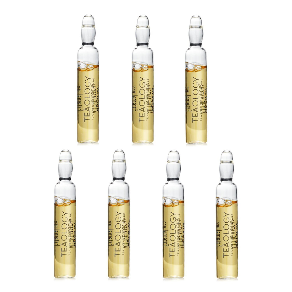 Matcha Tea Ultra Firming Ampoules in glass vials, delivering intense hydration and a natural lifting effect for youthful skin.