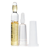 Teaology Matcha Tea Ultra Firming Ampoules in glass vials, featuring organic Matcha for plumping, hydration, and anti-aging benefits.