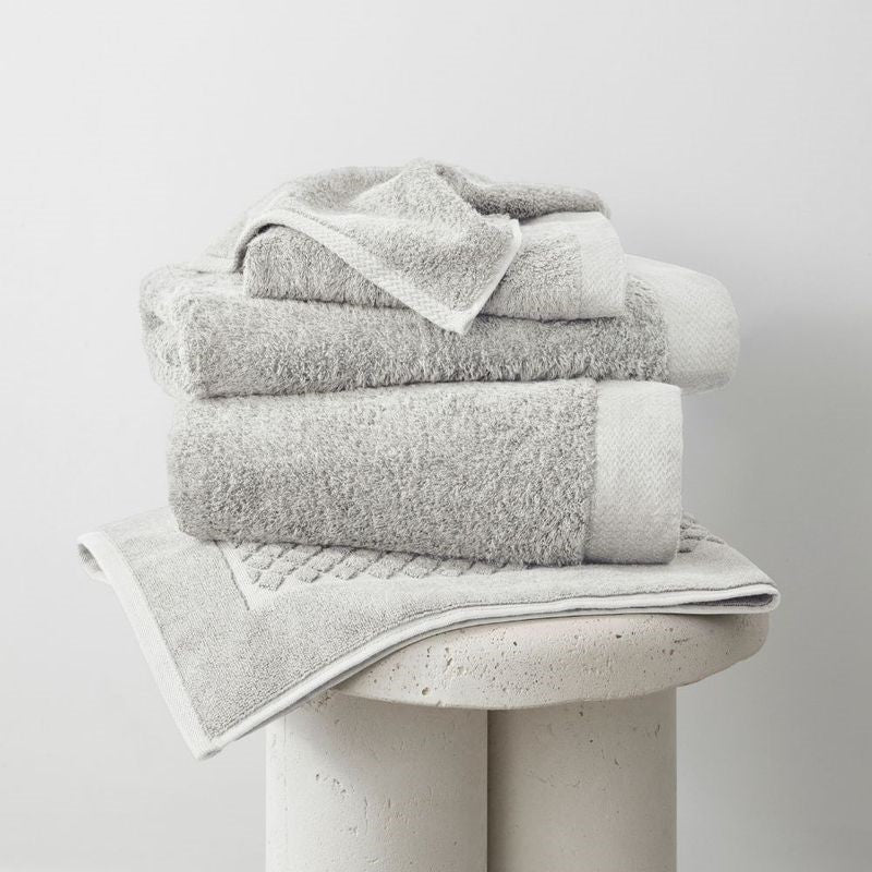 Eco-friendly silver bamboo hand towel, 46x76cm, 700gsm; soft, absorbent, and gentle on sensitive skin.