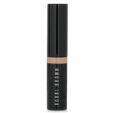 Bobbi Brown Skin Concealer Stick in #Warm Ivory for brightening dark circles and minimizing imperfections with a natural finish.