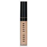 Bobbi Brown Skin Full Cover Concealer in Warm Ivory, 8ml, provides long-wear, natural coverage for flawless skin.