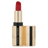 Luxurious Bobbi Brown Luxe Lipstick in #Parisian Red with satin finish, combining vibrant color and skincare benefits for smooth lips.